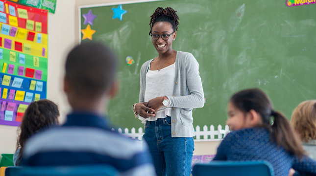 Teacher in front of classroom